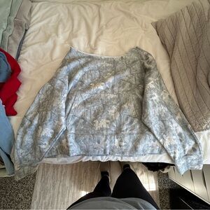 Super soft camo cropped sweater that is off the shoulder!